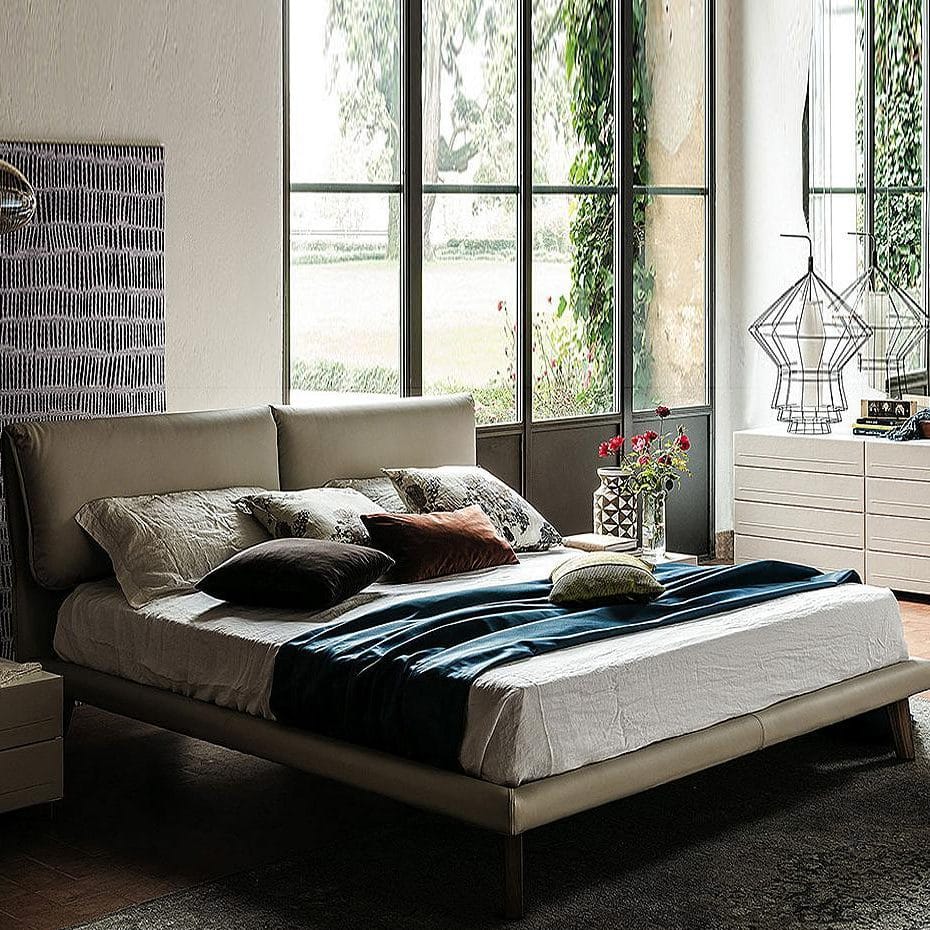 adam bed with blue sheets