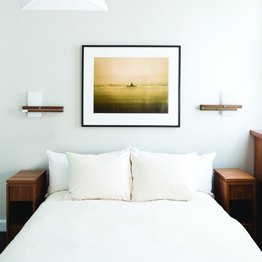led bedside sconce with reading light and USB charger.