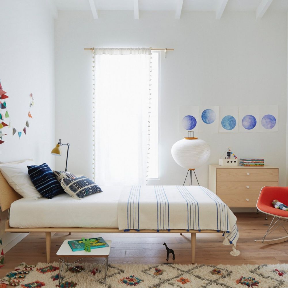 Modern Nelson thin bed in a trendy bedroom.